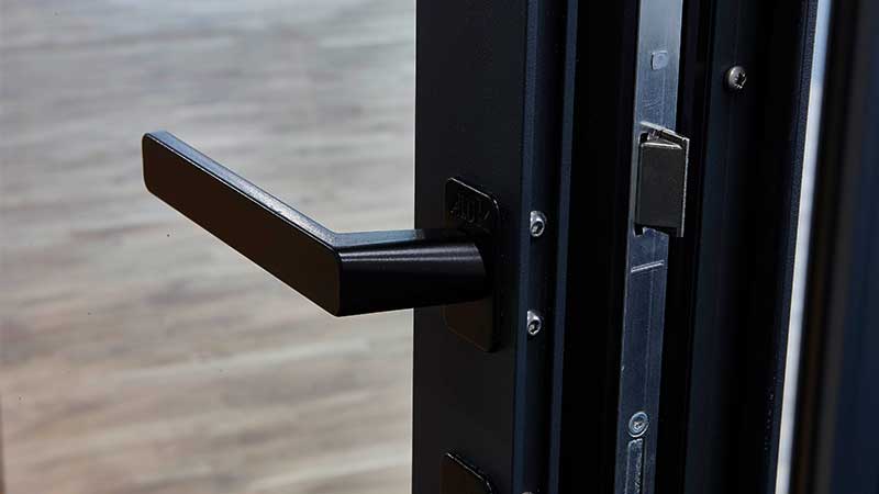 Secure bifold door handle