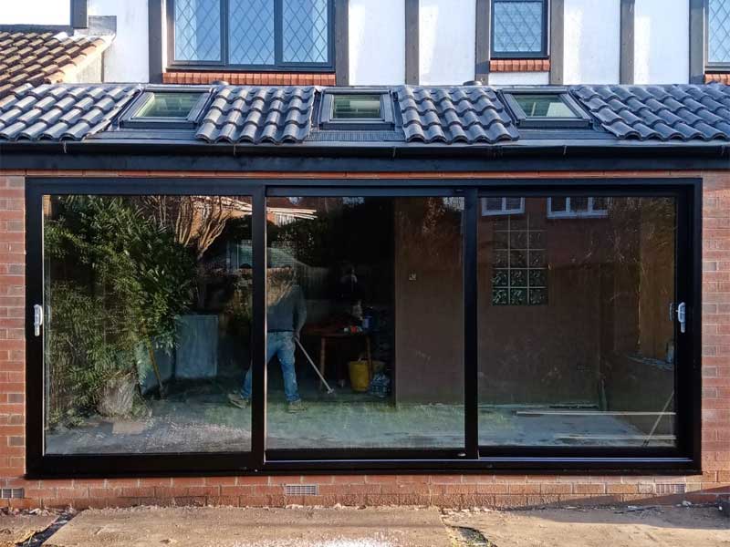 Triple track aluminium patio doors